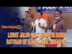 POLRES INHIL AMANKAN SEPASANG SUAMI ISTRI PEMBAWA RATUSAN HP ILEGAL
